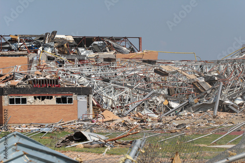 Fototapeta Natures Wrath - A huge pile of rubble left behind after an EF5 tornado causes total damage to evey home and business in it's mile wide path