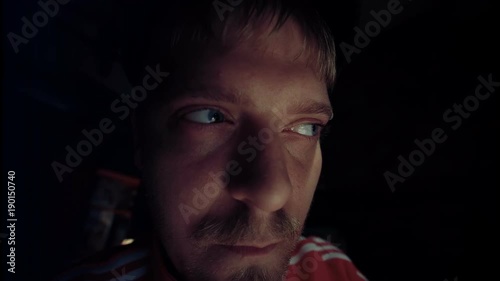 man worried and watch around