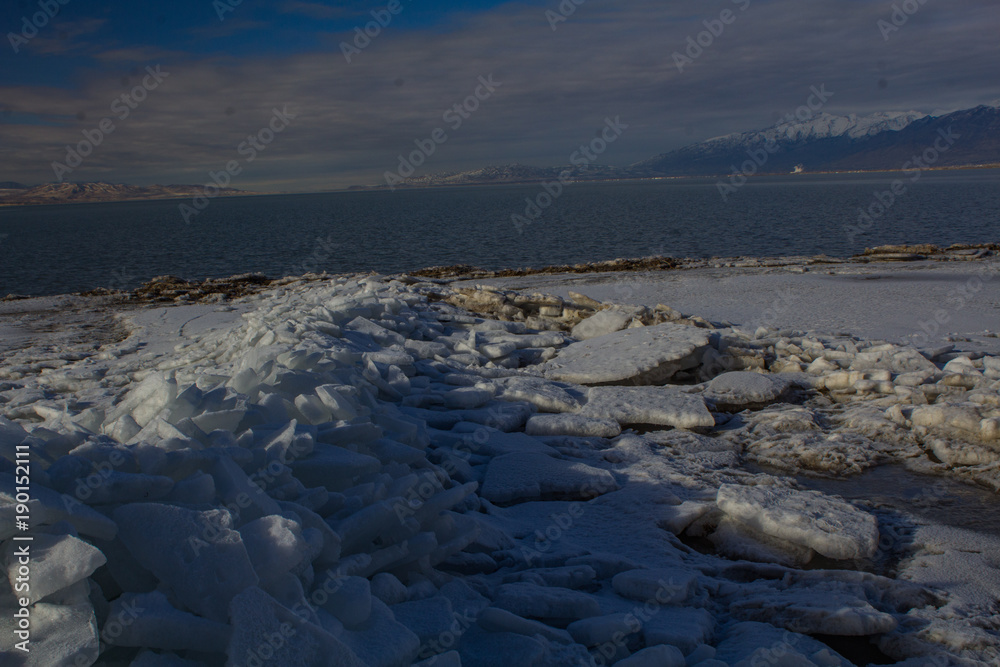 1/27/2018-Benjamin, Utah/USA- Ice sheets stacked along the edge of Utah Lake creating a tranquil feeling 1/27/2018-Benjamin, Utah/USA- Ice sheets stacked along the edge of Utah Lake creating a tranquil feeling