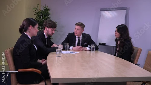 Business team meeting young people debating arguing on sales chart manager scowl