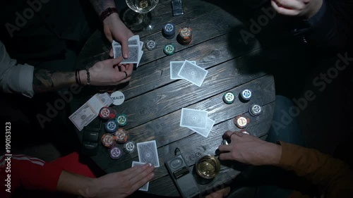 Croupier dealing cards in a poker