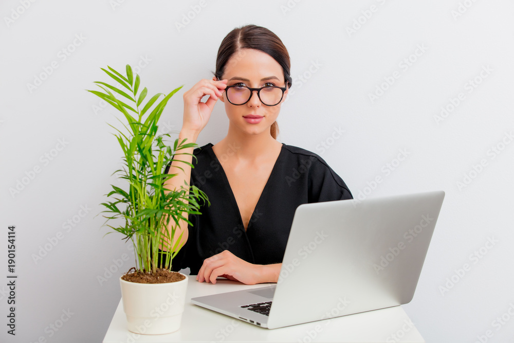 portrait of woman lagom style with laptop and palm portrait of woman lagom style with laptop and palm
