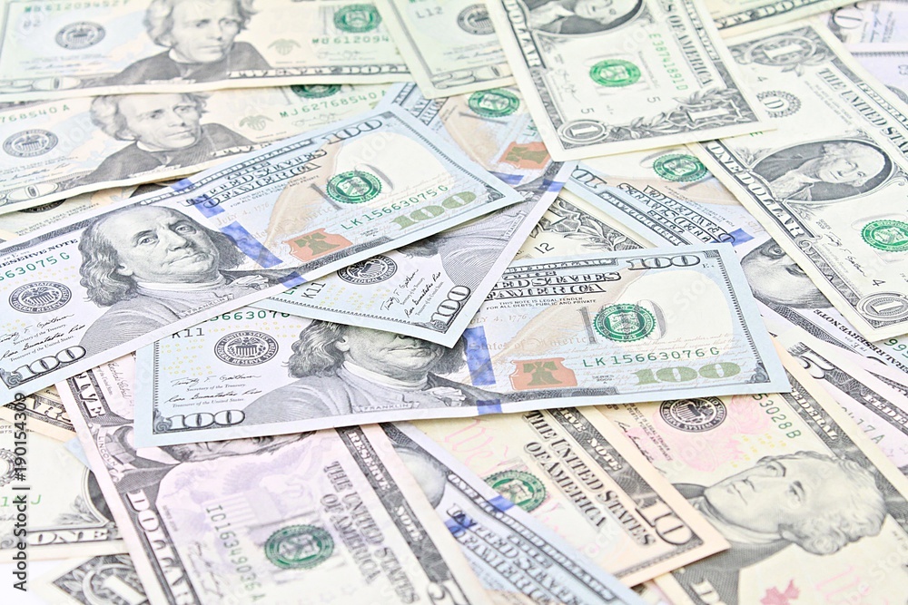 Business, finance, investment or money exchange concept : American Dollars cash money on white background Business, finance, investment or money exchange concept : American Dollars cash money on white background