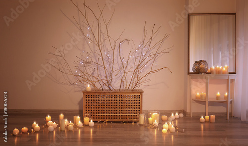 Burning candles as decor in...