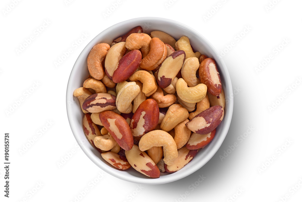 Brazilian and cashew nuts bowl on white background Brazilian and cashew nuts bowl on white background