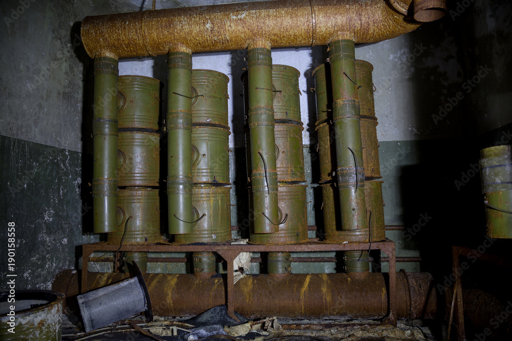 Ventilation chamber in abandoned Soviet bunker. Rusty filter ventilation  equipment Stock Photo | Adobe Stock