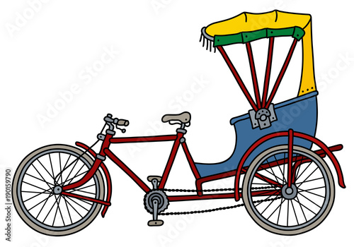 The classic red cycle rickshaw