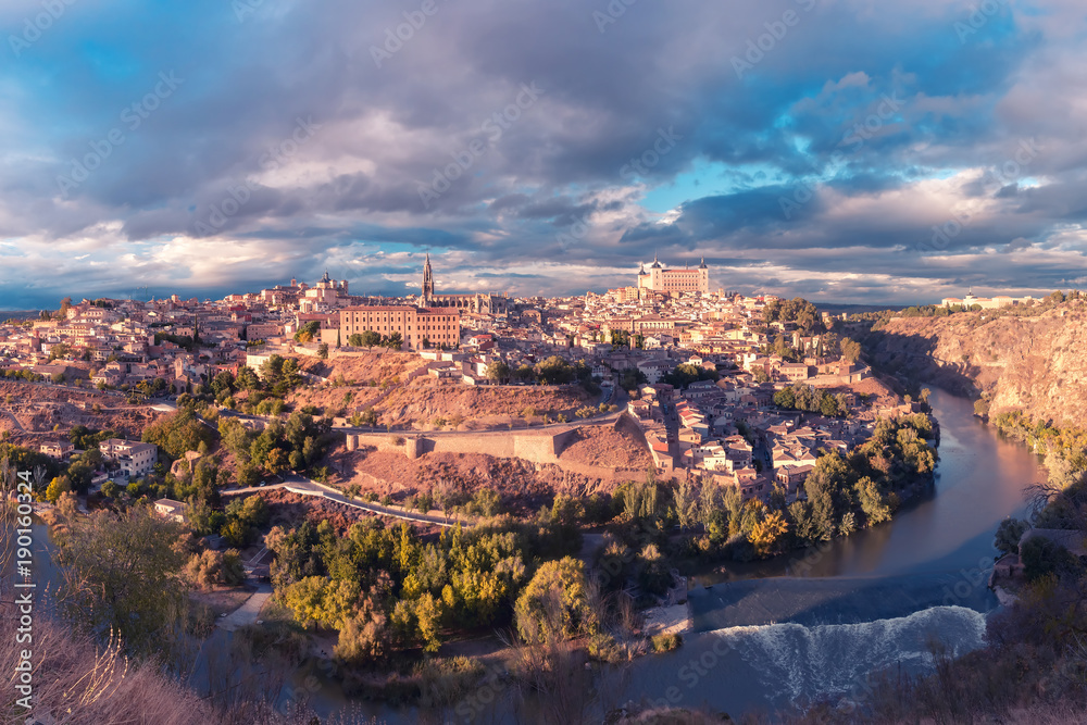Panoramic aerial view of Old city of Toledo and river Tajo in the overcast day, Castilla La Mancha, Spain