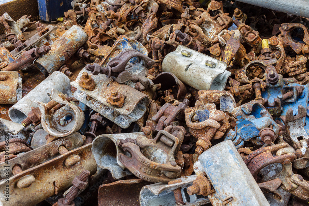 GULF OF THAILAND, OCTOBER 25,2017 : Photo of TCB Scaffold Pipe Clamp, Fixed Clamp, Swivel Camp, Double Camp, Base Plate, Beam Clamp, Putlog Camp and Sleeve Camp are pile together on the floor. GULF OF THAILAND, OCTOBER 25,2017 : Photo of TCB Scaffold Pipe Clamp, Fixed Clamp, Swivel Camp, Double Camp, Base Plate, Beam Clamp, Putlog Camp and Sleeve Camp are pile together on the floor.
