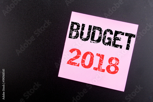 Word, writing Budget 2018. Business concept for Household budgeting accounting planning written on sticky note, black background with copy space