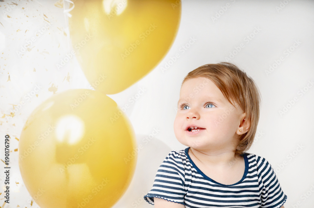 Portrait of little baby girl smiling on the day of birth Portrait of little baby girl smiling on the day of birth