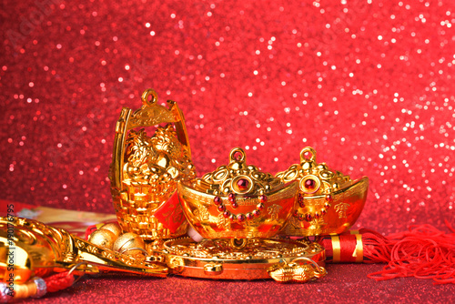 Chinese new year decorations and Auspicious ornaments on red bokeh background.