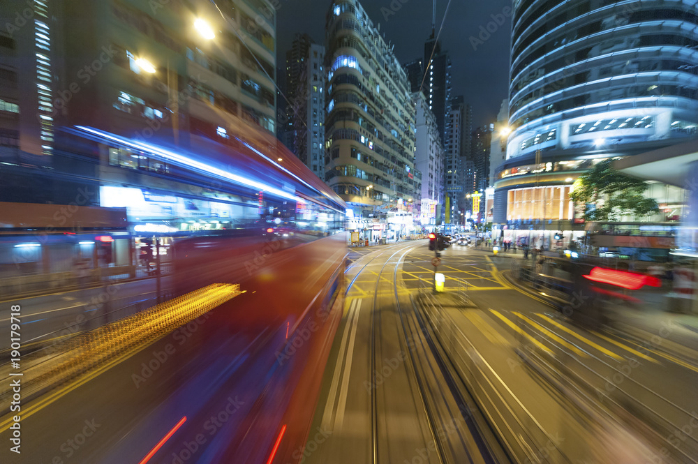 Fototapeta premium Traffic in downtown of Hong Kong city at night