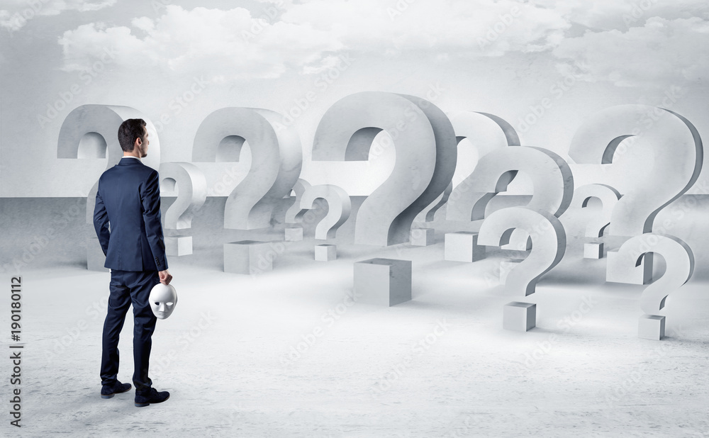 Man with lot of question mark signs and icons Man with lot of question mark signs and icons