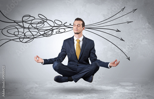 Businessman meditates with purifying doodle concept