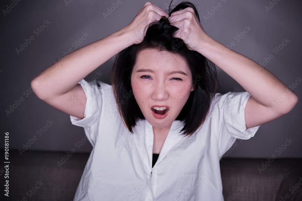 beautiful asian woman hand hold her hair with stressful emotion problem concept beautiful asian woman hand hold her hair with stressful emotion problem concept