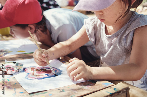 Kids painting art outdoor activity