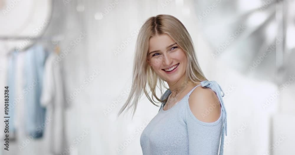 Sexy young woman laughing into camera Sexy young woman laughing into camera
