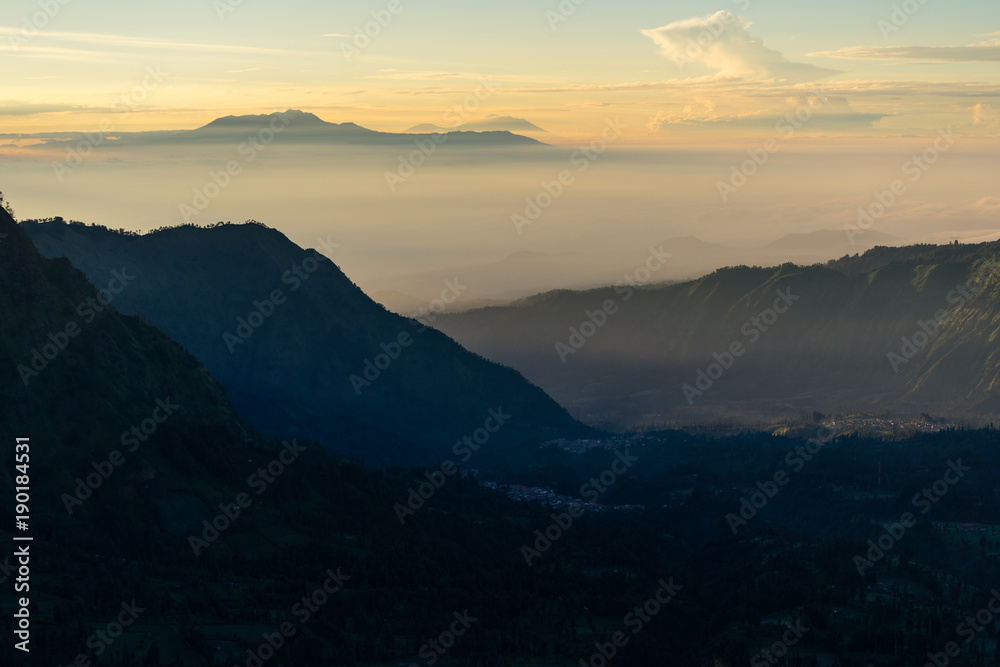 Beautiful landscape of Cemero Lawang valley in a morning sunrise, East Java, Indonesia