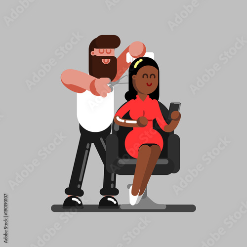 Barber cuts clients hair