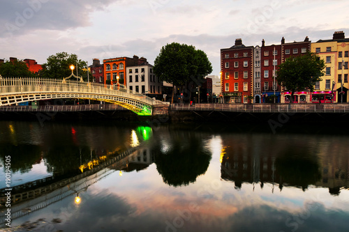 Morning view of famous illuminated Ha Penny Bridge in Dublin, Ireland © Madrugada Verde