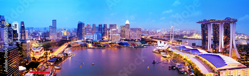 Photography Panorama of Singapore city skyline at sunset, aerial view