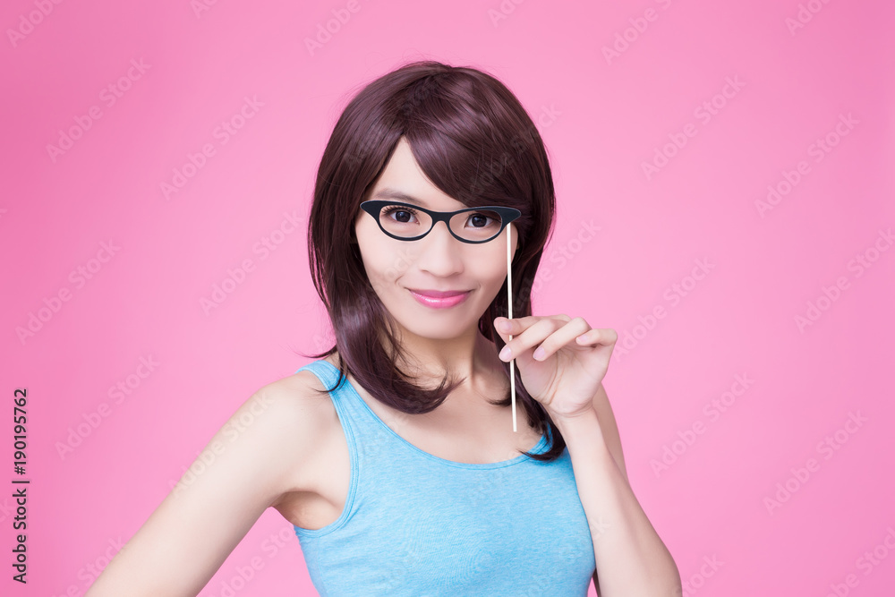 woman holding paper party sticks woman holding paper party sticks