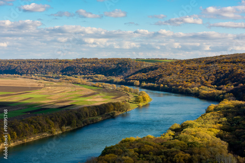 Fototapeta Naklejka Na Ścianę i Meble -  Autumn Landscape - river, sky with clouds, fields.