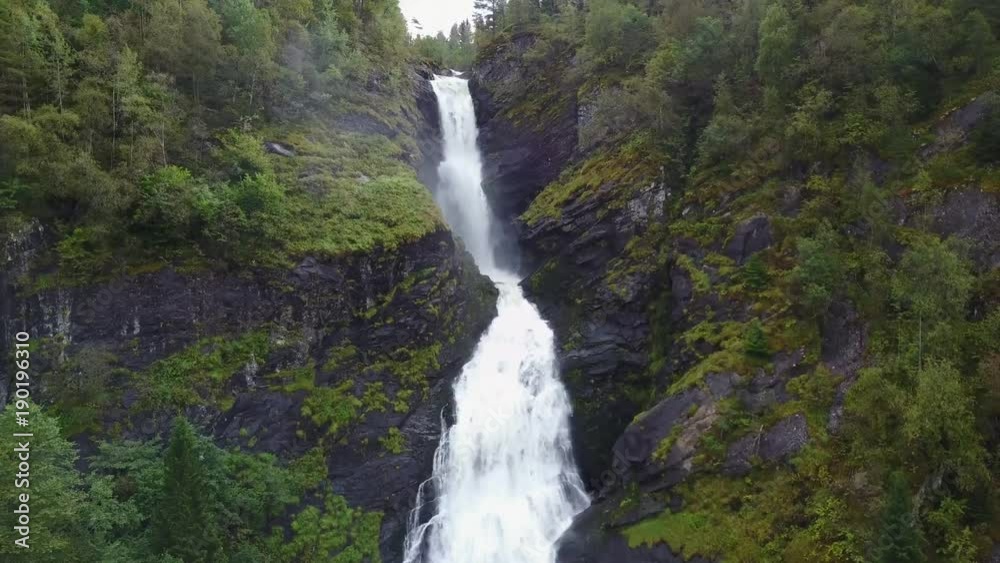 waterfall between bergen and alesund in norway