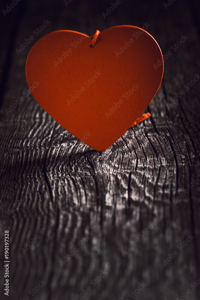 Fototapeta premium Heart shapes on rustic wooden background