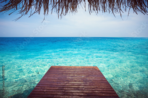 Картината върху платно Wooden pier with sea