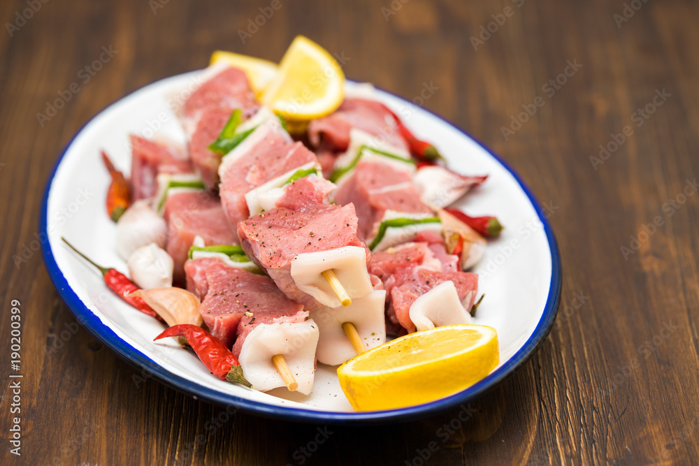raw turkey fillet with pepper and lemon raw turkey fillet with pepper and lemon