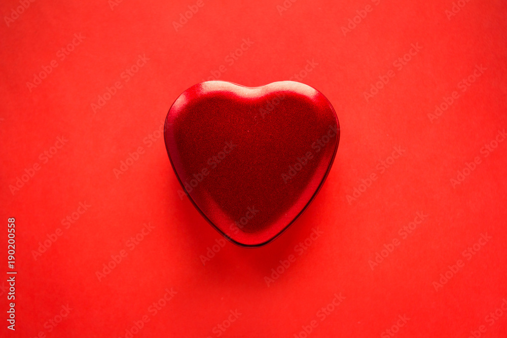 Heart and strawberry on a red Valentine's background
