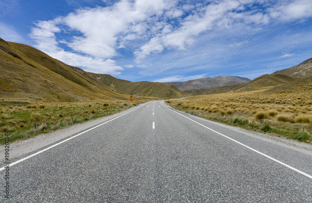 Highway road in Lindis pass New Zealand Highway road in Lindis pass New Zealand