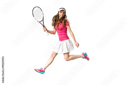 smiling young woman playing tennis and jumping isolated on white © LIGHTFIELD STUDIOS