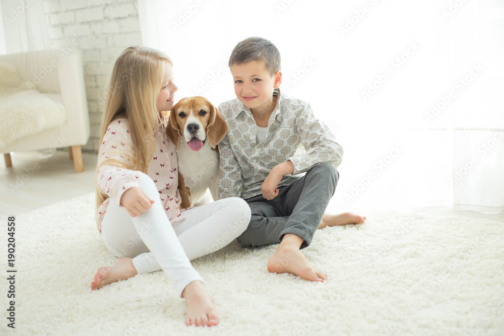 Fototapeta premium Children with a dog 