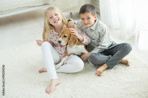Children with a dog 
