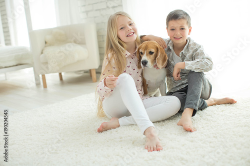 Canvas Print Children with a dog