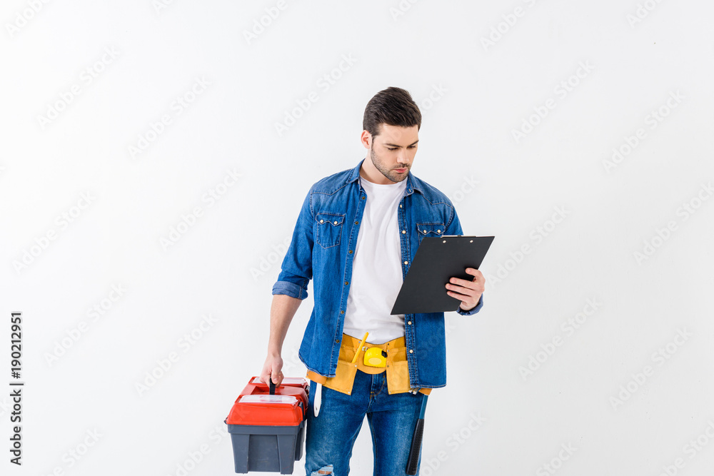 worker looking at clipboard isolated on white worker looking at clipboard isolated on white