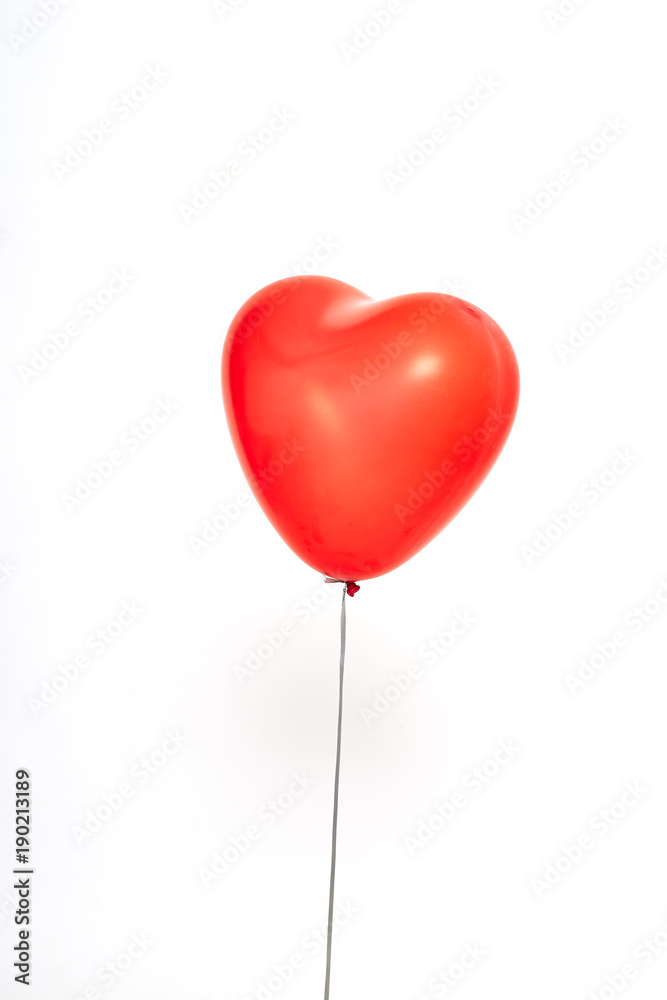 red heart balloons on a white