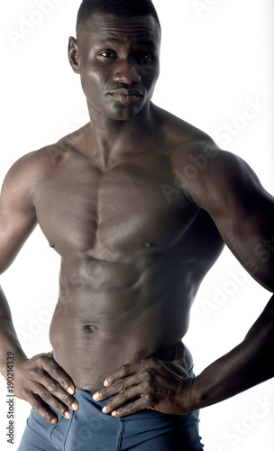 portrait of a muscular man on white background