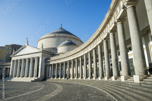 Scenic view of the curved colonnade of the Basilica Reale Pontificia San Francesco di Paola in the Piazza del Plebiscito in Naples, Italy