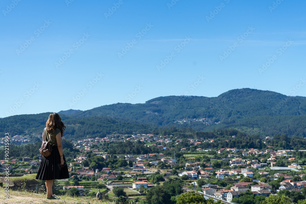 Young girl enjoying the landscape