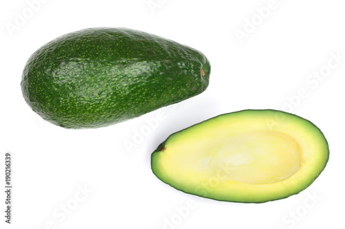 whole and half avocado isolated on white background close-up. Top view