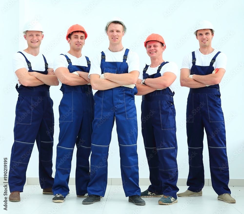 Obraz premium team of professional builders in helmets