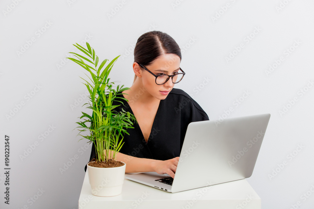 portrait of woman lagom style with laptop and palm portrait of woman lagom style with laptop and palm