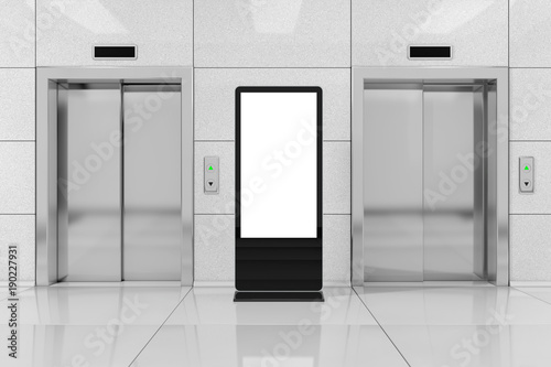 Blank Trade Show LCD Screen Stand as Template for Your Design near Modern Elevator or Lift with Metal Doors in Office Building. 3d Rendering