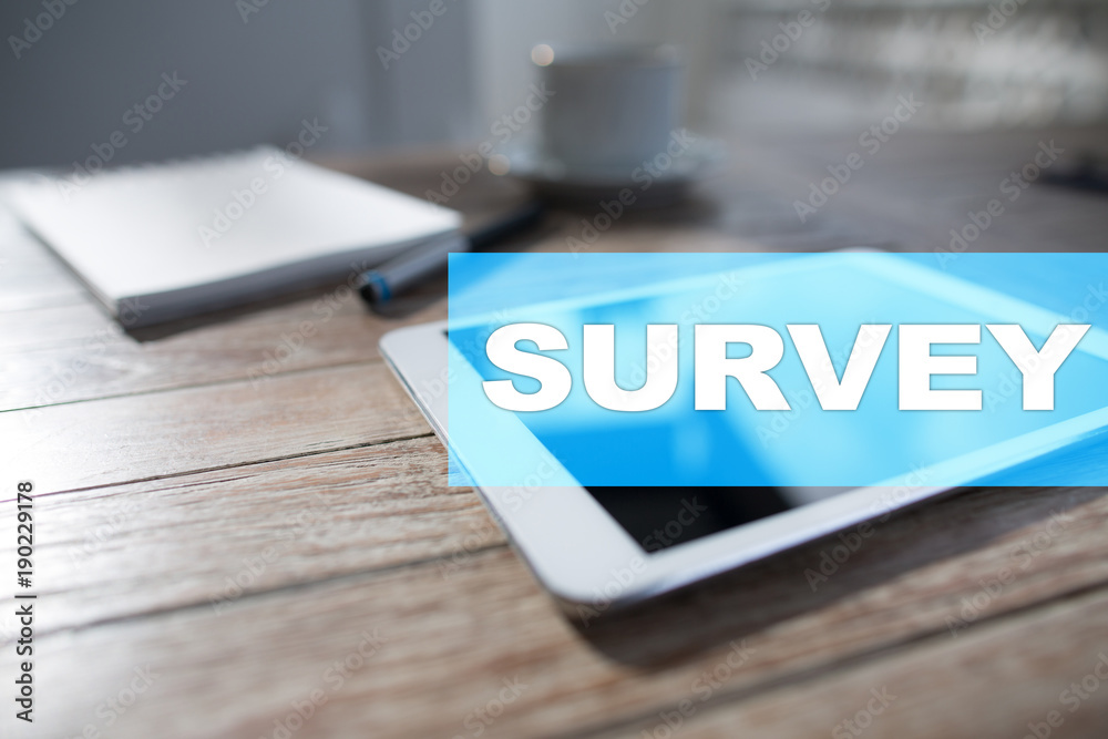 Naklejka premium Survey text on virtual screen. Feedback and customers testimonials. ?Business internet and technology concept.?