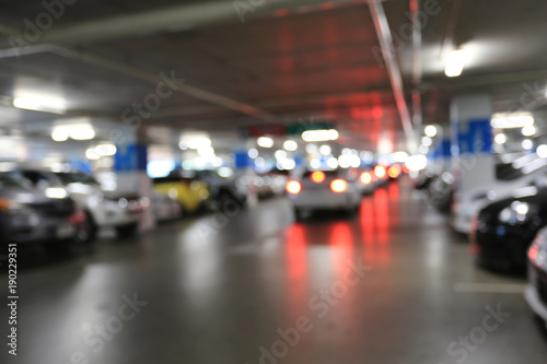 Blurred cars parking and bokeh light. © meepoohyaphoto