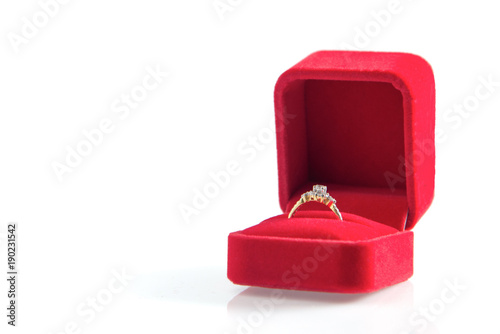 Red ring box with diamond jewelry for concept gift wedding birthday special given isolated on white background 